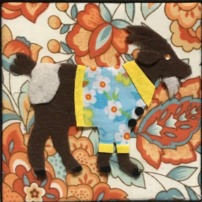 Brown Goat with Flowered Coat