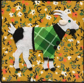 White Goat with Tartan Coat