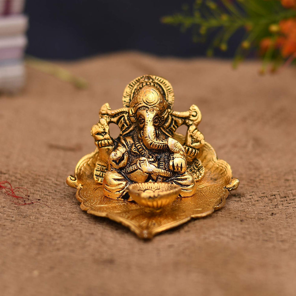 Thumbnail: Vrindavan Handicrafts - Copper Ganesh Idol with Diya on Leaf 