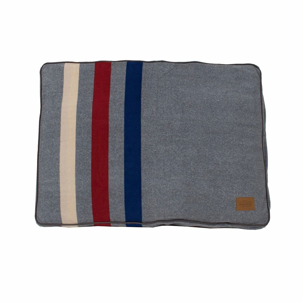 Grey pet bed with red, blue, and cream stripes