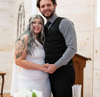 bride groom cutting cake