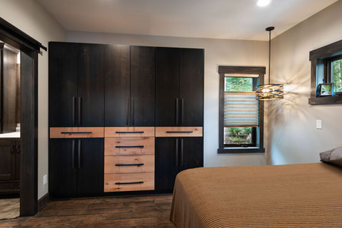Master bedroom custom cabinetry storage, Graber blinds and pendant lighting
