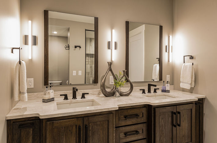 Master bathroom double vanity with custom cabinetry, undermount sinks and quartz countertop