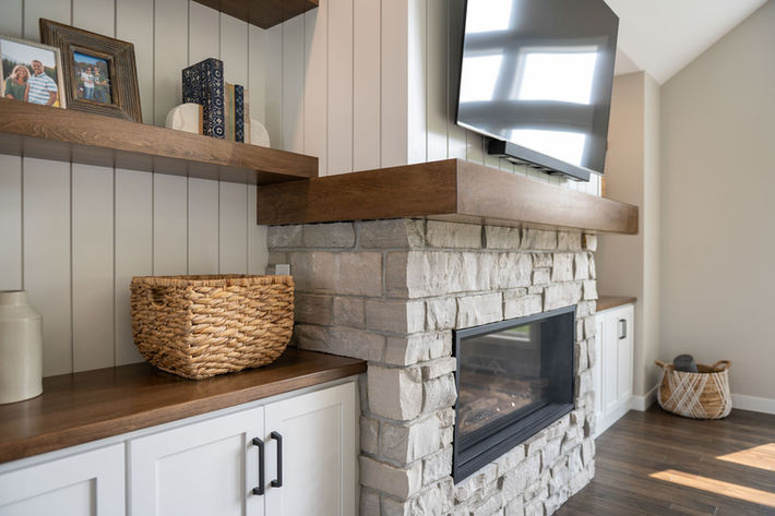 Detail of livingroom stone masonry fireplace