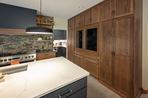 Quartz countertop kitchen island and custom cabinetry