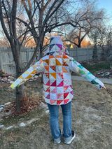 Scrappy, all-over HST quilt coat design