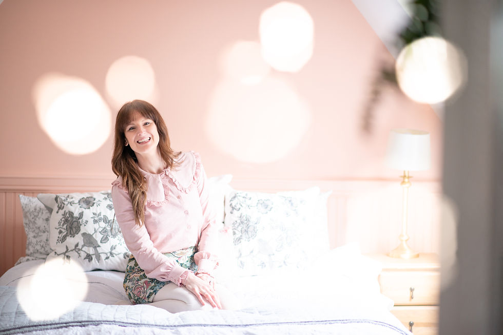 children-interior-stylist-in-aberdeen-sitting-on-bed-at-her-personal-brand-photoshoot-with