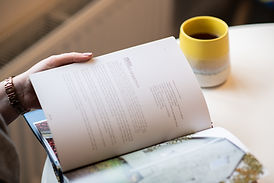 woman's-hands-reading-recipe-cookbook-at-personal-branding-photoshoot-with-aberdeen-headsh