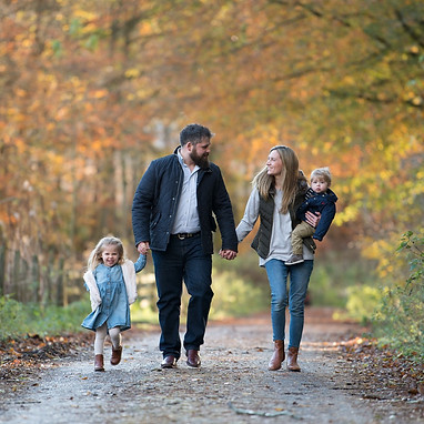 family-walking-hand-in-hand-in-autumnal-woods-in-scotland-at-photoshoot-near-aberdeen.JPG