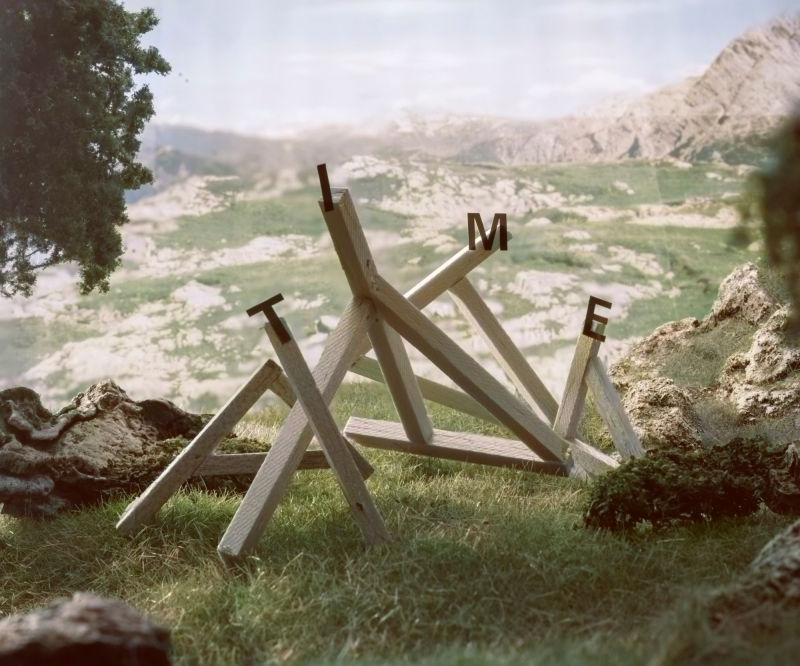 From the series Between the Mountains and Rivers (Austria), Rick van der Klooster. Time exposed on wooden poles. 