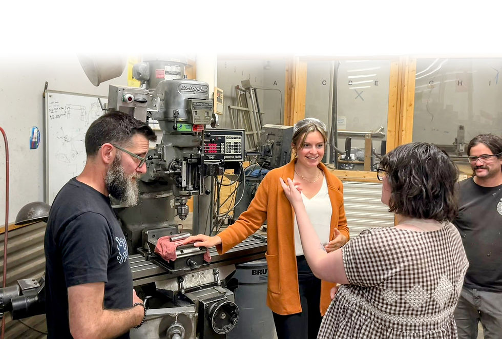 Empathic Engineering_Emily smiling in front of mill_Jul 2024 b.jpg
