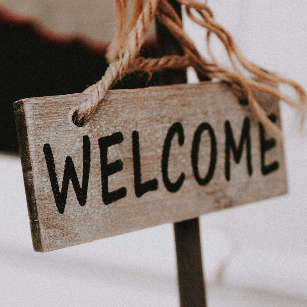 A sign that reads Welcome