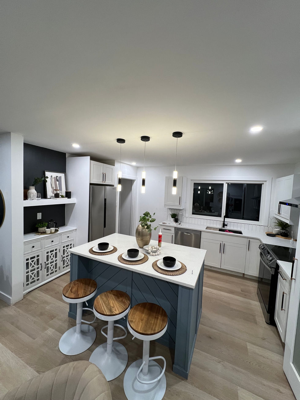 Chefs Kitchen with quartz counter, high end appliances and an eat in Island