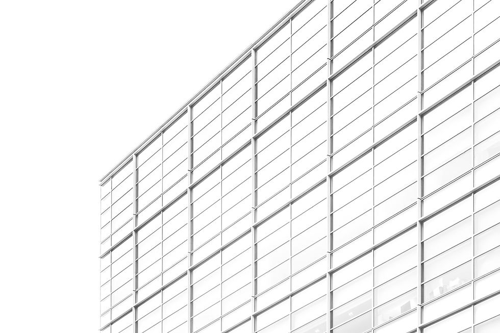 White architectural facade with repeating geometric panels, architectural photography in Canberra