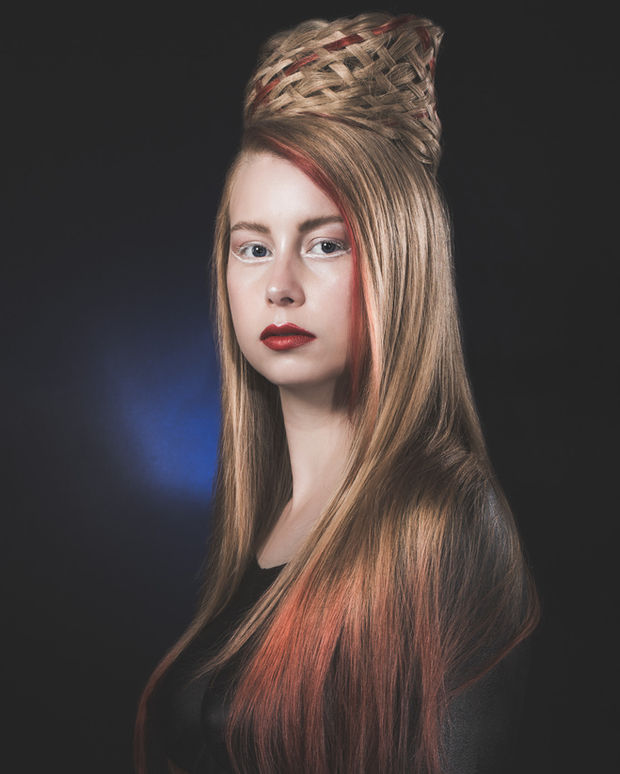 Creative portrait of a young woman with long hair