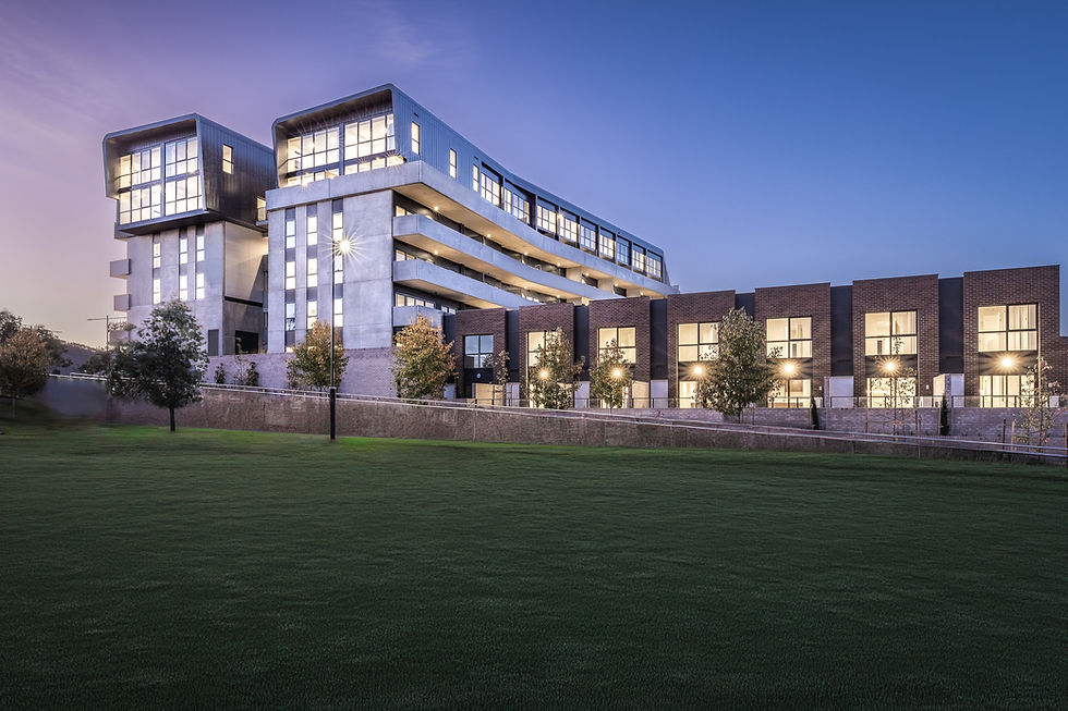 Modern building at dusk, ideal to start a photography business.