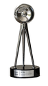 Photography award trophy with a silver circular top and three slender supports.