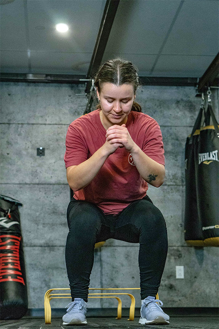 Centre de santé Nutrikin - Squat et entraînement