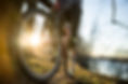 cyclist-resting-after-a-drive-along-the-river-bank-2023-11-27-05-08-28-utc.jpg