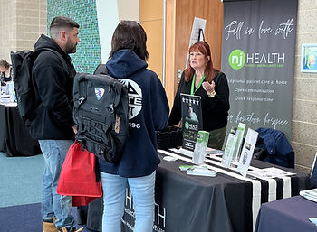 Community Liasion Patty Coifer speaks with attendees at the CVAC Health and Benefits Fair