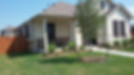 Leander TX Home, showing front of home, four 80% solar window (sun shade) screens on front of home.