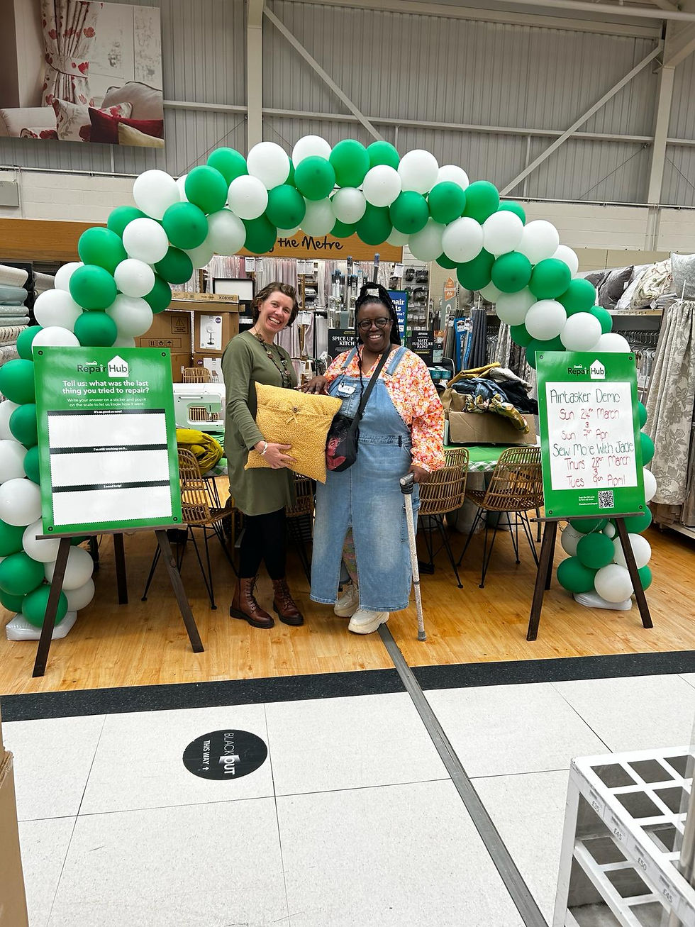 Woman receives package under balloon arch