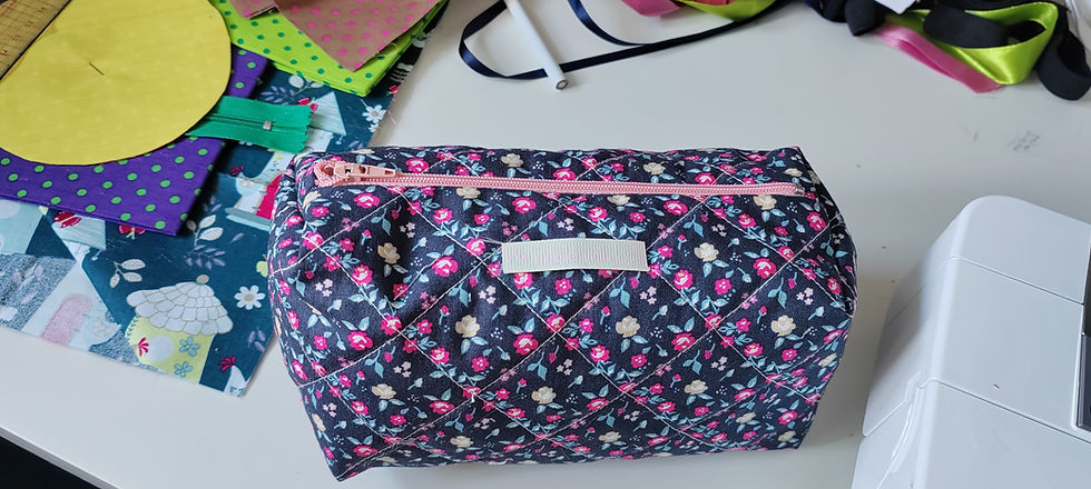 Quilted floral pouch and sewing supplies for beginners