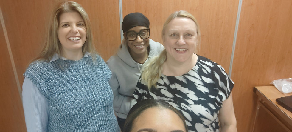 Smiling women from local sewing classes for beginners
