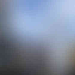 the tokyo skytree tower can be seen on a bustling street in the city