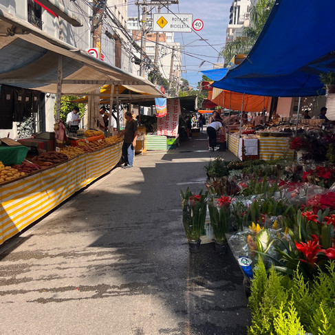 the street filled with market stalls