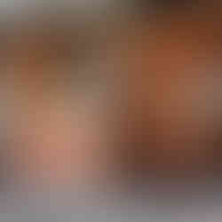 entrance of the restaurant with wood slat door