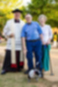 Fr. Linsky with Pat and Mary Callahan and "Cookie"