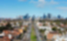 A wide shot of Victoria with homes, commercial spaces, skyscrapers and the sky