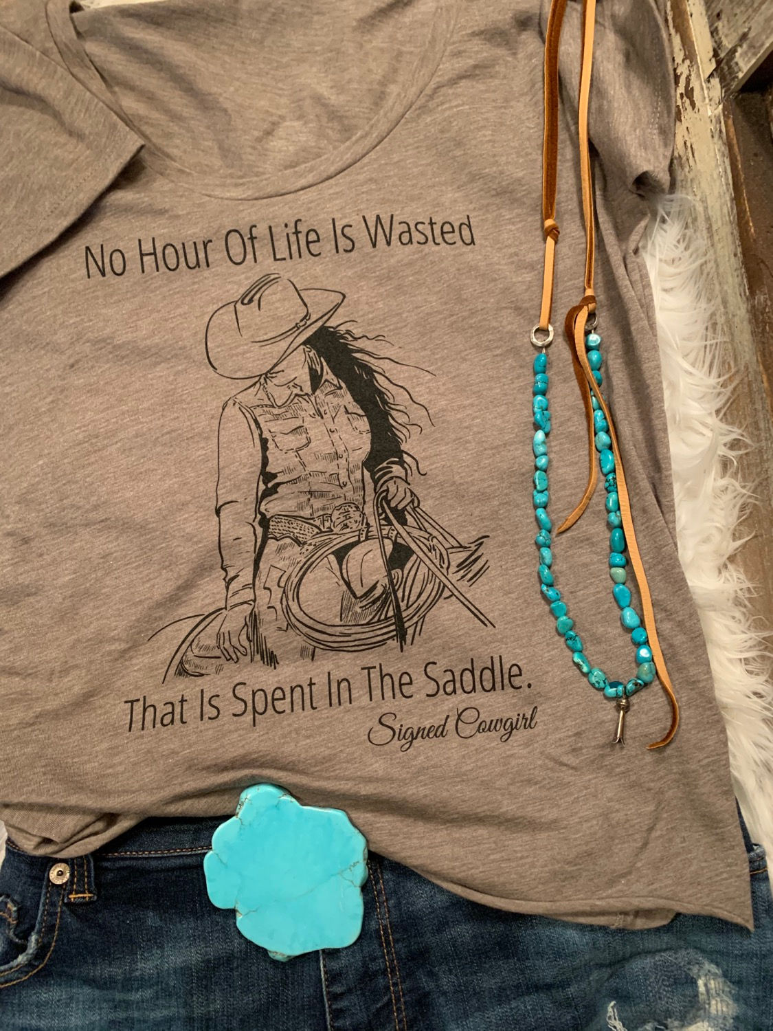 Signed Cowgirl Collection. No Hour Of Life Is Wasted In The Saddle Tee.