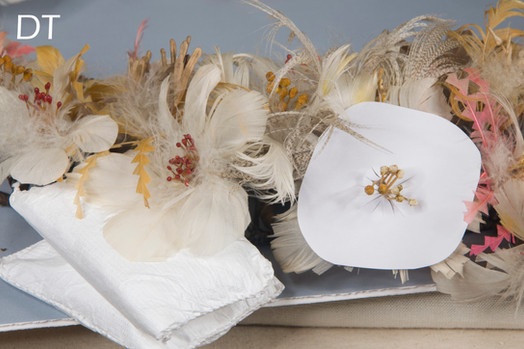 Damaged feather wreath conservation treatment