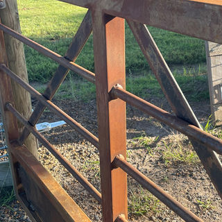 custom made rural property gate crafted from raw mild steel  Australia by Woods West Metalworks Bundaberg