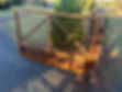 Rustic patina double Farmstead farm gate with hardwood post-and-rail fence on a rural driveway – custom steel farm gate