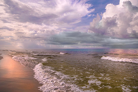Sunny Shores and Moody Skies