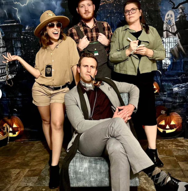 group photo of guests play midnight manor