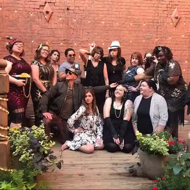 group photo in 1920s costumes