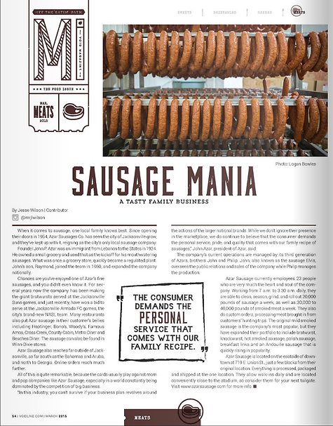 Fresh sausage hanging in the smoker