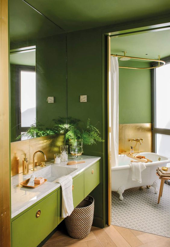 Cuarto de baño en color verde oliva estilo años 70. Uno de los colores del año 2024. Fuente El Mueble revista.