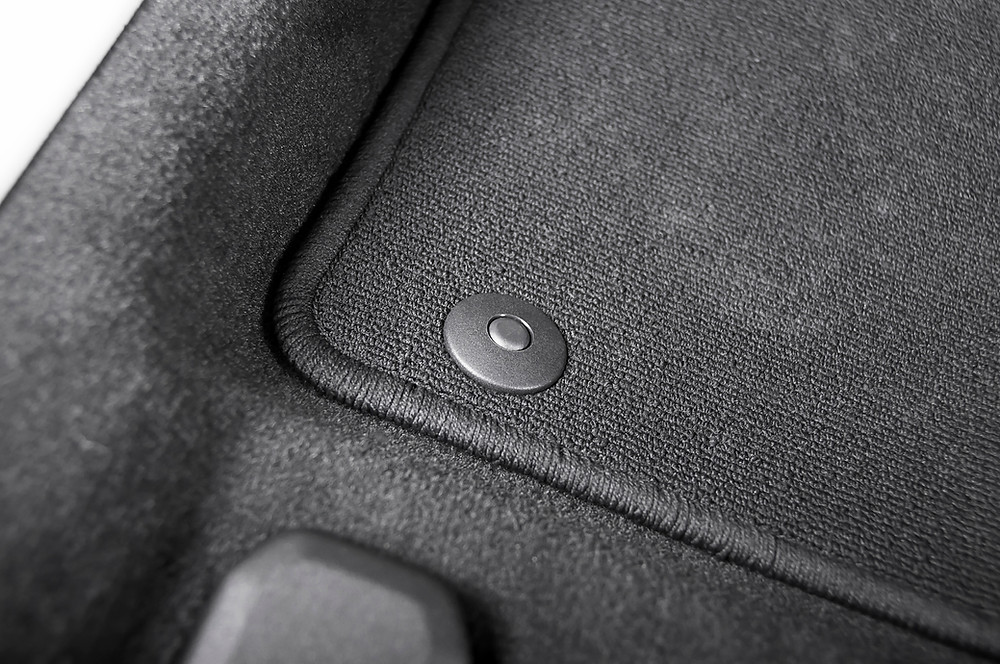 Clean black car floor mat