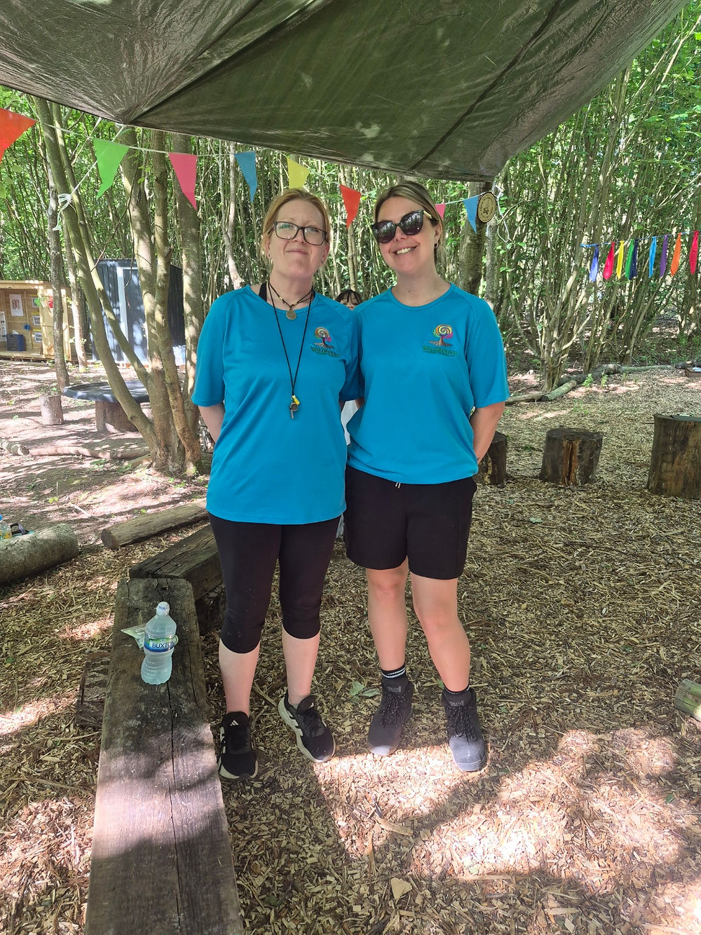 Two Wildbound Forest School Leaders at basecamp
