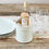 Thumbnail: Satin Cream Wine cooler on rustic wooden table top with rose wine in ice, glasses and plates