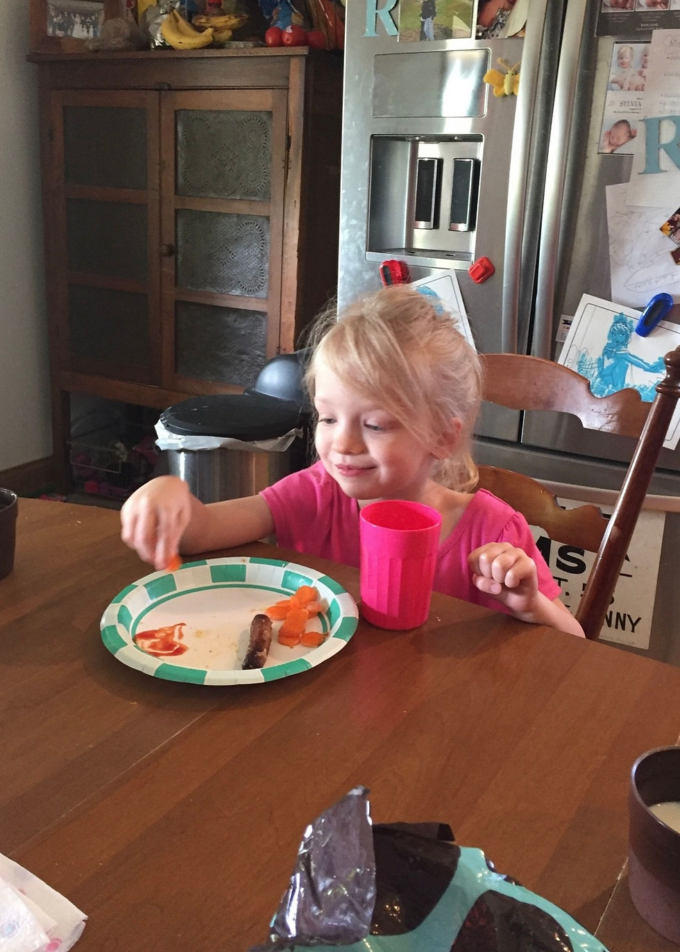 A photo of a girl eating lunch
