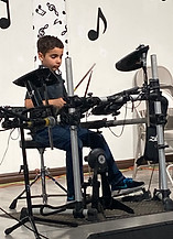 Drummer Ezra on stage.JPEG