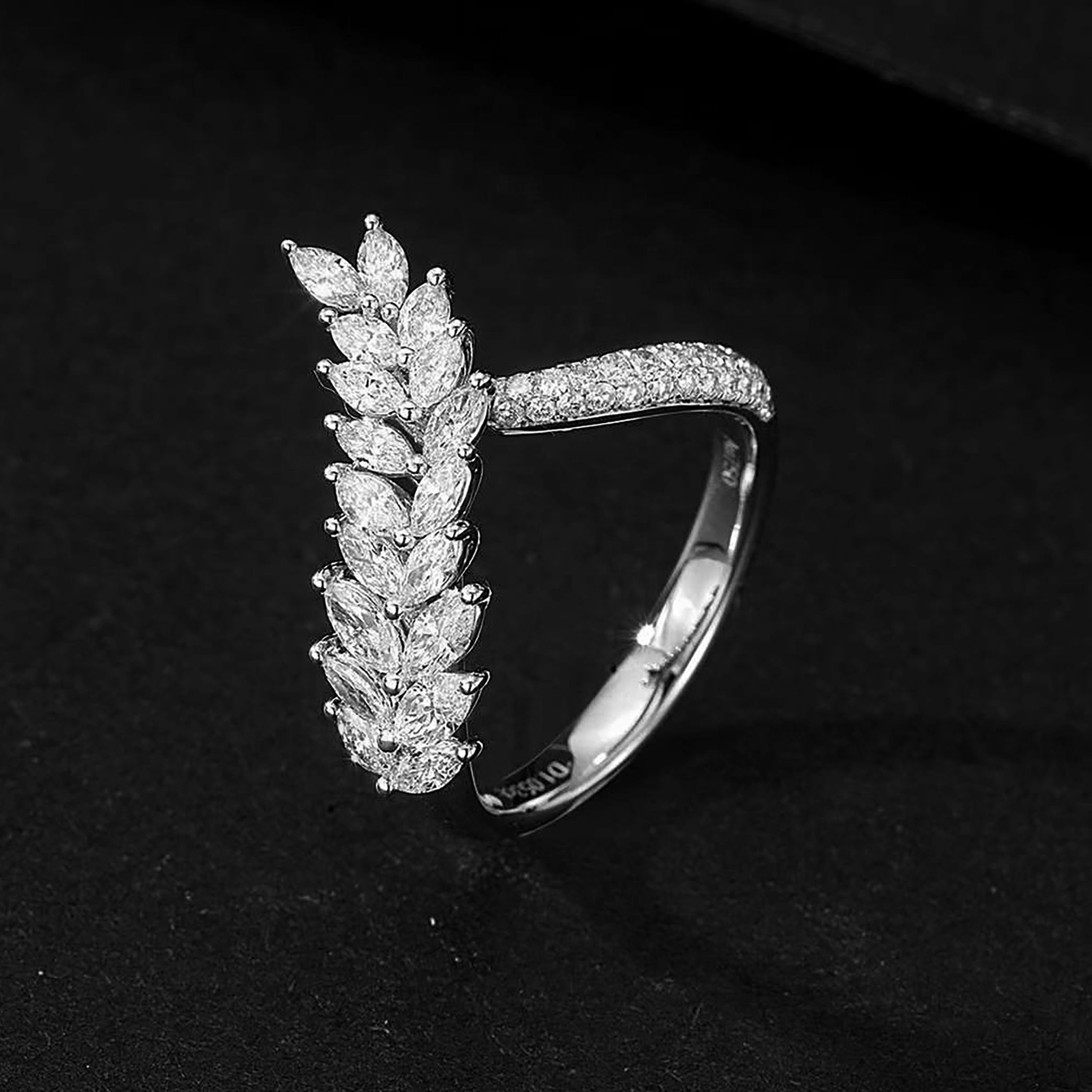 X FEATHER COCKTAIL RING