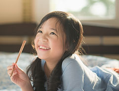 KS2 student reading at home, building English foundations