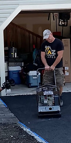 Photo by Ronda Media showing driveway renovation equipment in use for A-Z Contracting Services in East Stroudsburg, PA